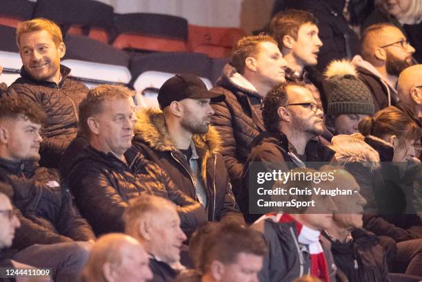 Professional snooker player Steven Hallworth watches amongst the Lincoln City fans during the Sky Bet League One between Lincoln City and Accrington...