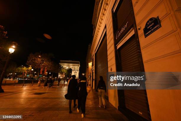 Cartier, Luxury brand on Champs Elysees Avenue, switch lights off early for energy conservation as of 1st November due to Paris mayor energy-saving...