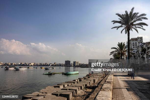 This picture taken on October 31, 2022 shows some of the concrete blocks installed to break the Mediterranean sea waves along the corniche in Egypt's...