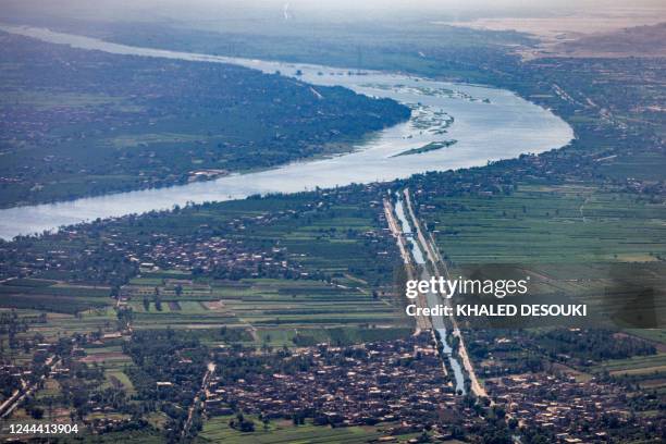 This picture taken on October 9, 2022 shows an aerial view of farmland in the countryside north of Egypt's southern city and province of Luxor. The...