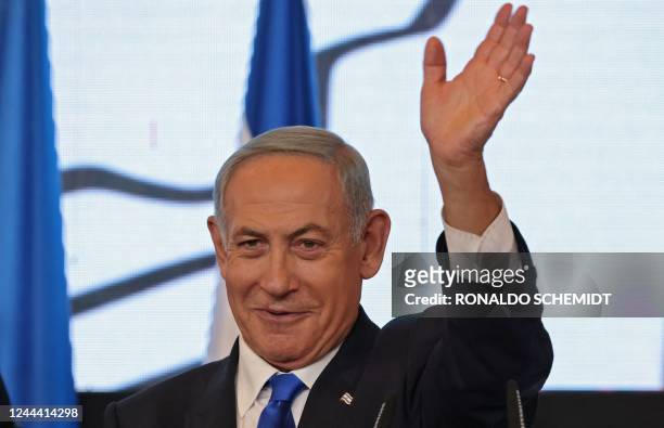 Israel's ex-premier and leader of the Likud party Benjamin Netanyahu addresses supporters at campaign headquarters in Jerusalem early on November 2...