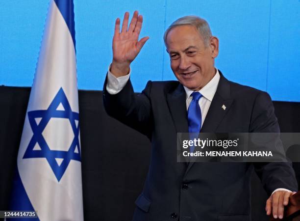 Israel's ex-premier and leader of the Likud party Benjamin Netanyahu addresses supporters at campaign headquarters in Jerusalem early on November 2...