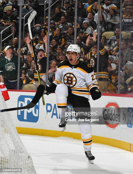 Hampus Lindholm of the Boston Bruins celebrates his game winning overtime goal against the Pittsburgh Penguins during the game at PPG PAINTS Arena on...
