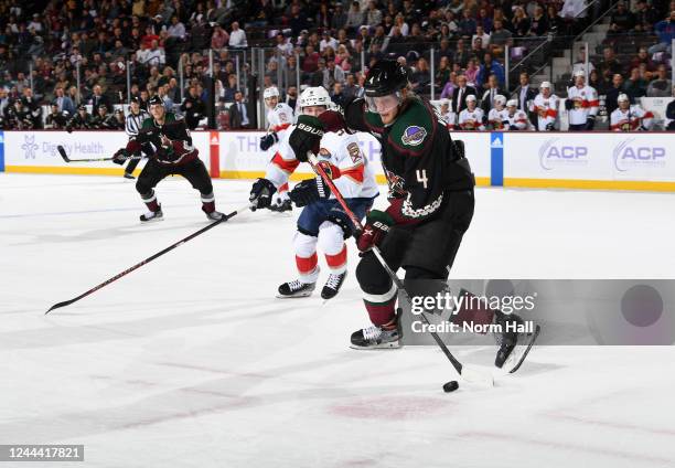 Jusso Valimaki of the Arizona Coyotes prepares to pass the puck during the second period against the Florida Panthers at Mullett Arena on November...