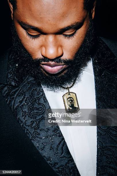 Director Ryan Coogler with a Chadwick Boseman necklace on at a special screening of "Black Panther: Wakanda Forever" held at AMC 34th Street 14 on...