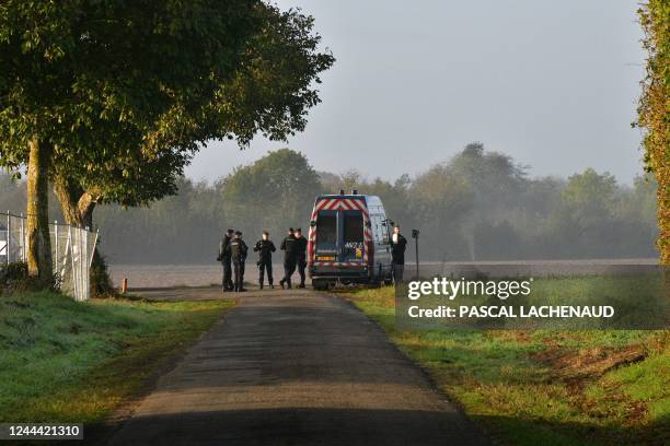 French gendarmes stand guard as they prepare for the arrival of activists who are expected to stage a protest against the "basins" near the...