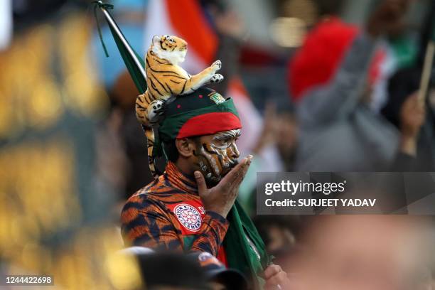 Bangladesh fan watches the ICC men's Twenty20 World Cup 2022 cricket match between India and Bangladesh at Adelaide Oval on November 2, 2022 in...