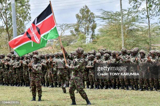 Kenya Defence Forces soldiers attend a flag presentation ceremony by Kenya's President William Ruto before they deploy to the Democratic Republic of...