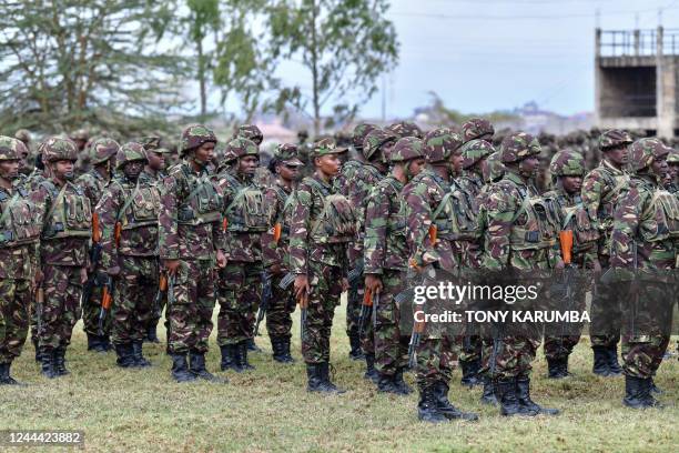 Kenya Defence Forces soldiers attend a flag presentation ceremony by Kenya's President William Ruto before they deploy to the Democratic Republic of...