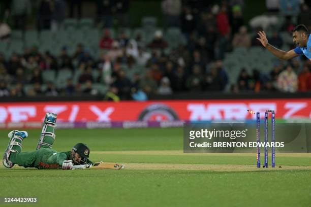 Bangladesh's Litton Das fails to gain his ground and run out by the direct hit of India's KL Rahul during the ICC men's Twenty20 World Cup 2022...