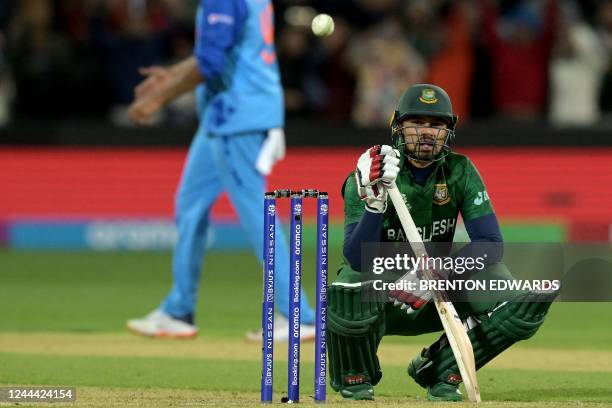 Bangladesh's Nurul Hasan reacts after their loss during the ICC men's Twenty20 World Cup 2022 cricket match between India and Bangladesh on November...