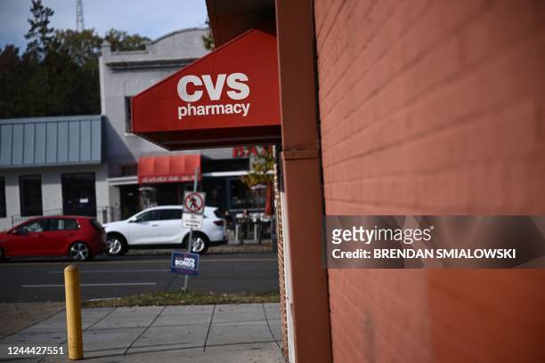 The entrance of a CVS Pharmacy in Washington, DC, on November 2, 2022. CVS Health said they had agreed to pay approximately $5 billion over 10 years...