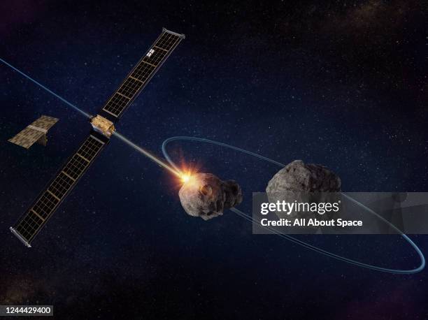 Artist rendering of the NASA Double Asteroid Redirection Test space probe approaching the asteroid Didymos and its minor-planet-moon Dimorphos. The...