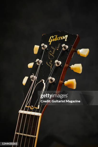 Detail of the headstock and Kluson Deluxe tuners on a vintage 1960 Gibson Les Paul Standard electric guitar, taken on November 26, 2020.