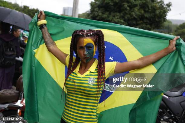 Supporter of Jair Bolsonaro poses during a demostration in front of the Eastern Military Command building as part of demonstrations in support of...