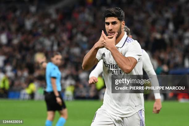 Real Madrid's Spanish midfielder Marco Asensio celebrates after scoring his team's fourth goal during the UEFA Champions League 1st round day 6 Group...