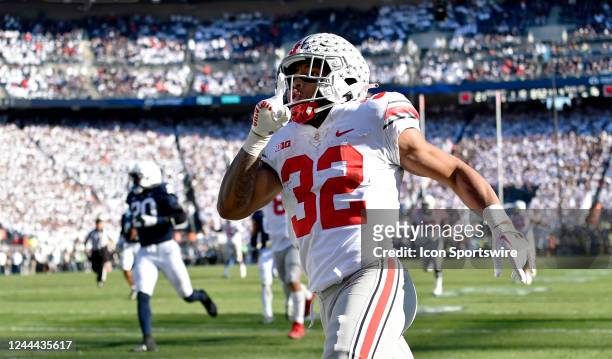 Ohio State running back TreVeyon Henderson celebrates after scoring a long touchdown run during the Ohio State Buckeyes versus Penn State Nittany...