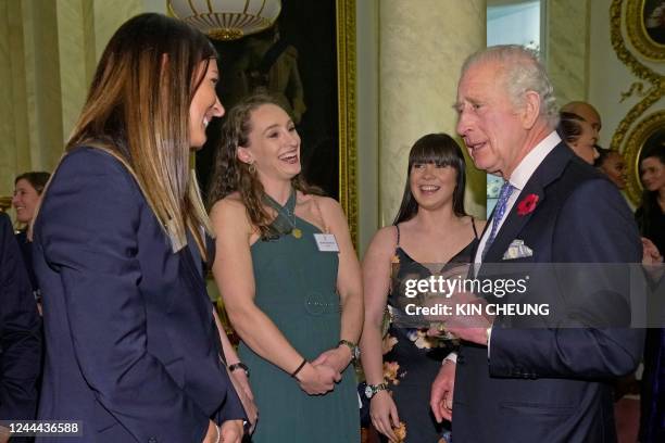 Britain's King Charles III meets with Eve Muirhead , Jennifer Dodds and Hailey Duff at a reception for medallists from the Tokyo 2020 Olympic and...