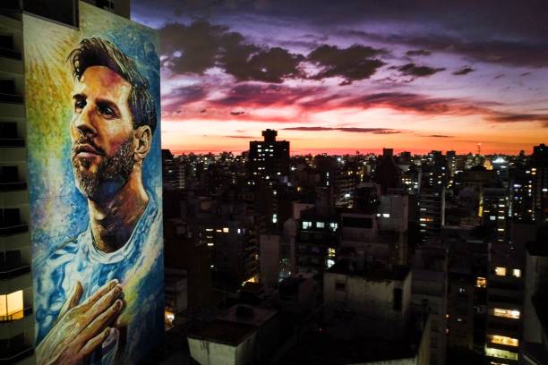 Aerial view of a mural of the Argentine football star Lionel Messi at sunset, on October 20, 2022 in Rosario, Argentina. - Local passion, makeshift...