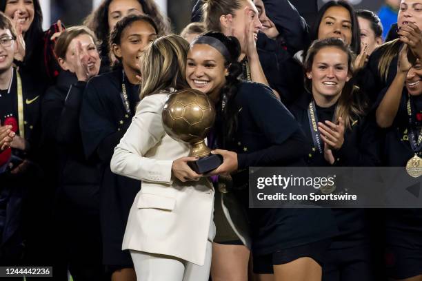 Portland Thorns forward Sophia Smith receives the MVP trophy for the match during the NWSL Championship match between the Portland Thorns and Kansas...