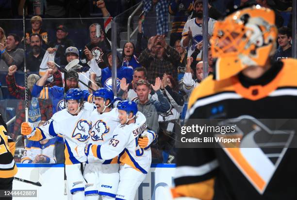 Alex Tuch of the Buffalo Sabres celebrates his third period goal against Casey DeSmith of the Pittsburgh Penguins with Owen Power and Jeff Skinner...