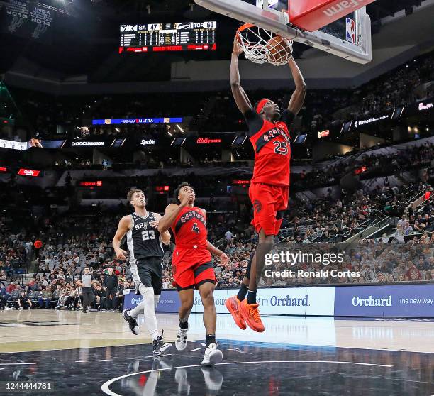 Chris Boucher of the Toronto Raptors dunks against the San Antonio Spurs in the first half at AT&T Center on November 02, 2022 in San Antonio, Texas....