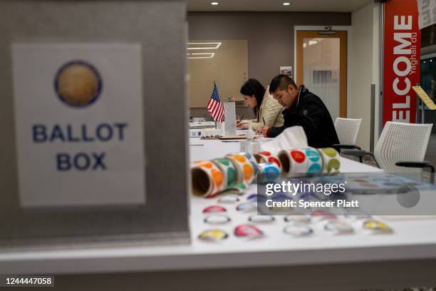 People participate in voting in the upcoming midterm elections at a Native Alaskan voting station at Cook Inlet Tribal Council on November 02, 2022...