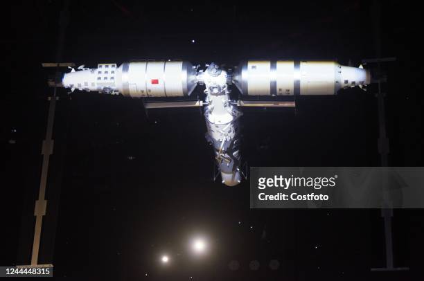 Model of China's space station in the "T" configuration is pictured at the Shanghai Planetarium in Shanghai, China, July 18, 2021. On Nov 3 according...