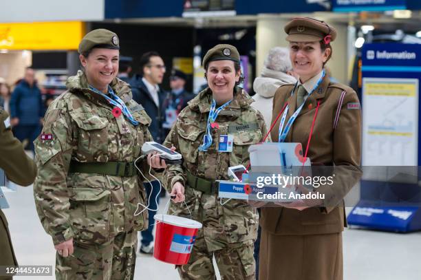 Members of the Armed Forces sell poppies at Waterloo Station during London Poppy Day in London, United Kingdom on November 03, 2022. More than 2,000...