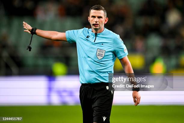 Referee Michael Oliver gestures during the UEFA Champions League group F match between Shakhtar Donetsk and RB Leipzig at The Marshall Jozef...