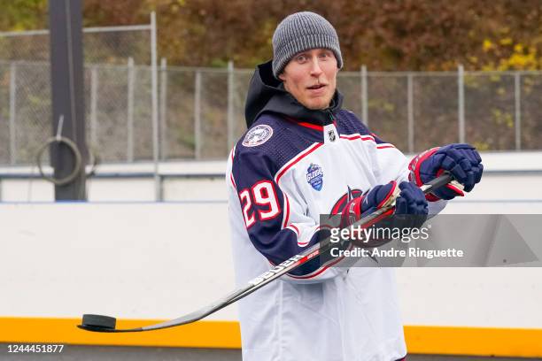 Patrik Laine of the Columbus Blue Jackets visits a childhood outdoor rink prior to the 2022 NHL Global Series Finland between the Colorado Avalanche...