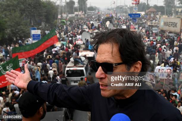 In this photograph taken on November 1 Pakistan's former prime minister Imran Khan speaks while taking part in an anti-government march in...