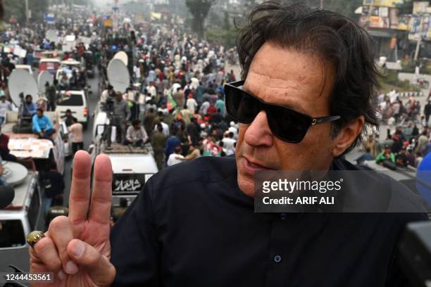 In this photograph taken on November 1 Pakistan's former prime minister Imran Khan speaks while taking part in an anti-government march in...