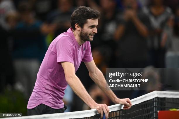 France's Gilles Simon reacts after losing against Canada's Felix Auger-Aliassime at the end of their men's singles round of 8 tennis match on day...