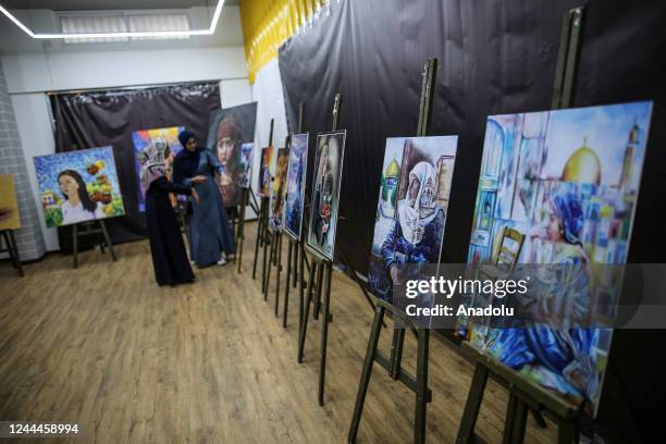 Palestinians attend the opening of the exhibition to mark the 105th anniversary of Balfour Declaration, which was a public statement issued by the...