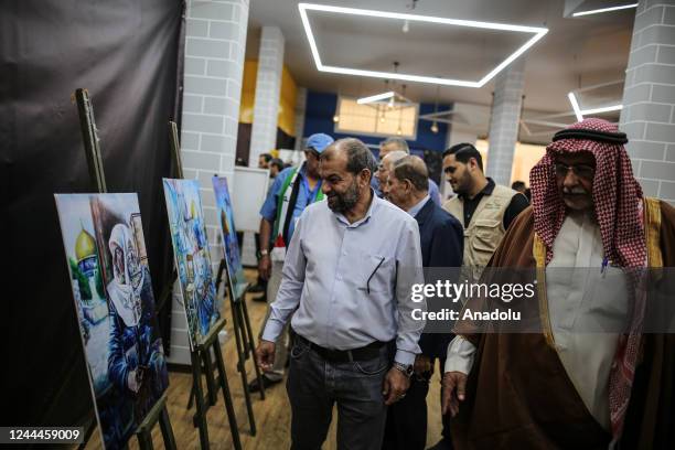 Palestinians attend the opening of the exhibition to mark the 105th anniversary of Balfour Declaration, which was a public statement issued by the...