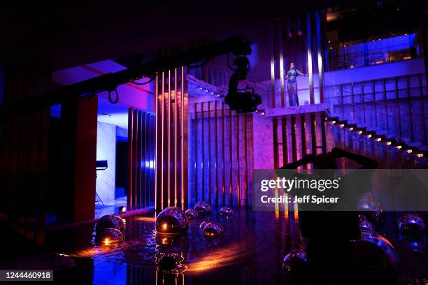 In this image released on November 3 Tate McRae behind-the-scenes with director Courtney Phillips on the set of the 10:35 music video at Dubais...