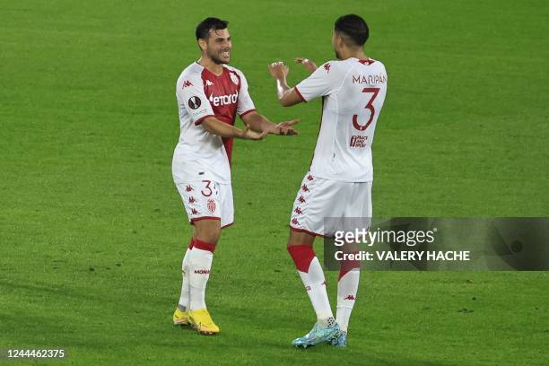 Monaco's German forward Kevin Volland celebrates with Monaco's Chilean defender Guillermo Maripan after scoring his team's second goal during the...