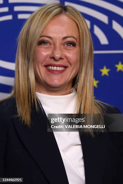 Newly appointed Italian Prime Minister Giorgia Meloni smiles at the European Parliament headquarter in Brussels, on November 3, 2022. - Italy's...
