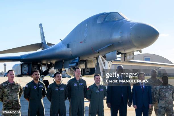 Secretary of Defense Lloyd Austin and South Korea's Minister of National Defense Lee Jong-sup pose for a photo in front of a B-1 bomber during a...