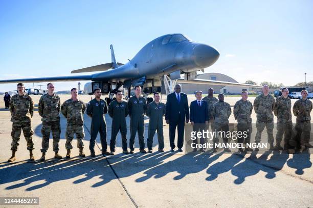Secretary of Defense Lloyd Austin and South Korea's Minister of National Defense Lee Jong-sup pose for a photo in front of a B-1 bomber during a...