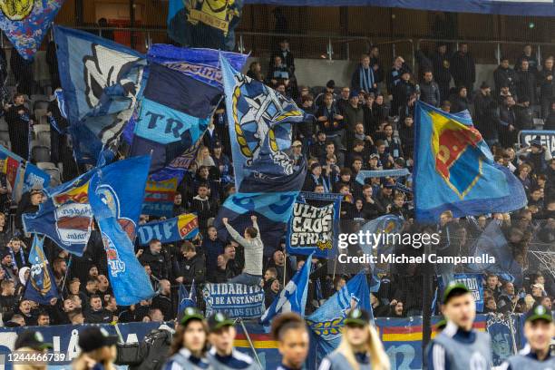 Djurgarden supporters wave flags during the UEFA Europa Conference League group G match between Djurgardens IF and Shamrock Rovers at Tele2 Arena on...