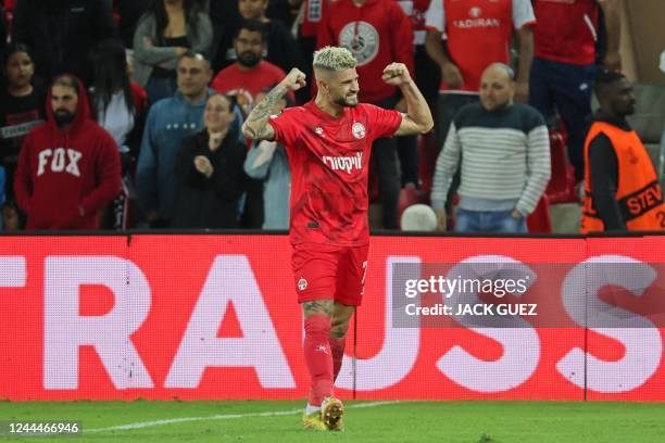 Hapoel Beer-Sheva's Israeli midfielder Ramzi Safouri celebrates after scoring a goal during the UEFA Europa Conference League football match between...