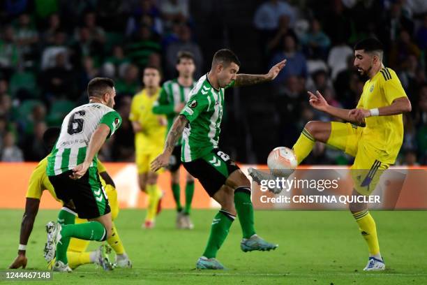 Real Betis' Spanish forward Aitor Ruibal vies with Helsinki's Morrocan midfielder Nassim Boujellab during the UEFA Europa League 1st round group C...