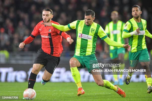 Rennes' French forward Amine Gouiri fights for the ball with AEK Larnaca's Bosnian defender Hrvoje Milicevic during the UEFA Europa League Group B...
