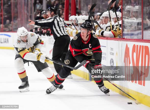 Brady Tkachuk of the Ottawa Senators controls the puck against Nicolas Roy of the Vegas Golden Knights at Canadian Tire Centre on November 3, 2022 in...