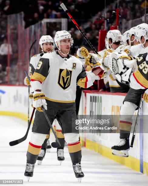 Reilly Smith of the Vegas Golden Knights celebrates his first period goal against the Ottawa Senators with teammates at the players bench at Canadian...