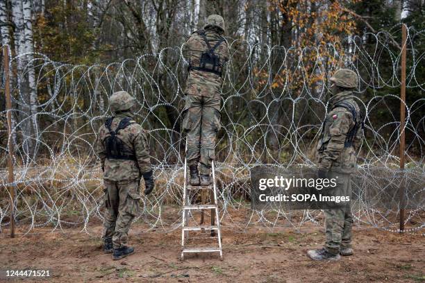 Polish soldiers are building a razor wire fence along the border with the Russian exclave of Kaliningrad. Polands government has authorized the...