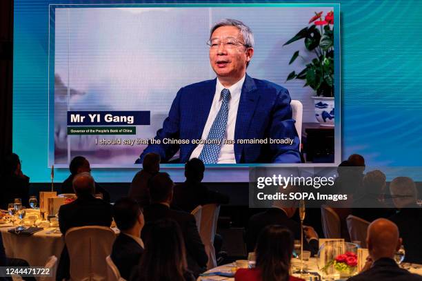Screen shows Yi Gang, governor of the People's Bank of China , speaking in a prerecorded interview during the Global Financial Leaders' Investment...
