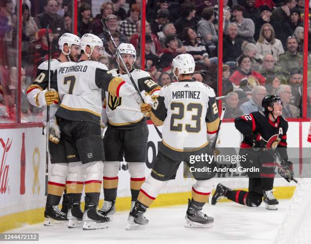 Chandler Stephenson of the Vegas Golden Knights celebrates his second period goal against the Ottawa Senators with teammates Alex Pietrangelo,...